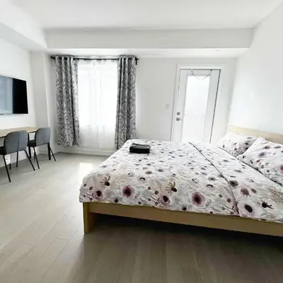 Modern Private Room Private Bathroom with King Bed with TV and Optional Balcony 10 minutes to Rogers Stadium Midtown Downtown Toronto