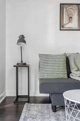 a living room with a couch and a table at Elegant Condo, Toronto Views , CityPlace Downtown in Toronto
