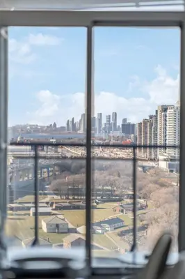 a view of a city skyline from a window at Elegant Condo, Toronto Views , CityPlace Downtown in Toronto