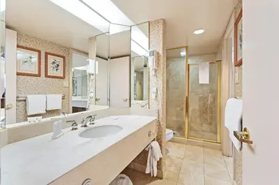 a bathroom with a large sink and a shower at Resort Style with Balcony Hot Tub and Full Kitchen in Edgar