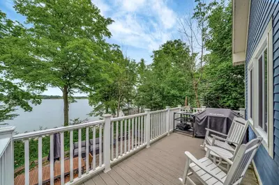 a porch with two chairs and a tent on it at The Balsam - 36 Farm View in Cherry Valley