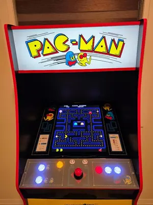 a racing game console with arax man on top of it at Beautiful House Near Grand River & Kiwanis Park in Kitchener