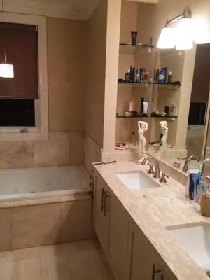 a bathroom with two sinks and a bath tub at Luxury Home - Upper Toronto Beaches in Toronto