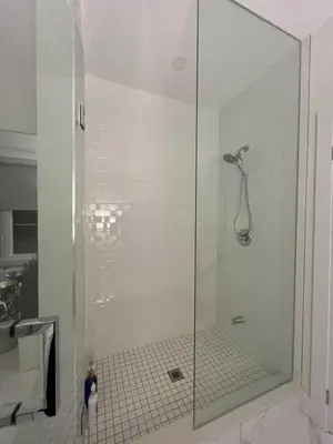 a shower with a glass door in a bathroom at French Style Mansion In Prestigious Angus Glen Markham in Markham