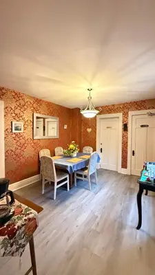 a dining room with a table and chairs at Entire guest suite in the Falls in Niagara Falls