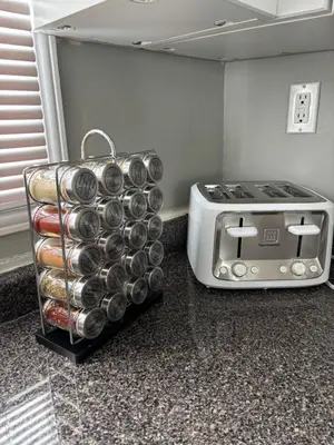 a toaster and a toaster oven on a counter at Waterfront Cottage Near Toronto Private Dock, Water Crafts, BBQ Wi-Fi - Sleeps 4 in Manvers