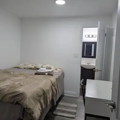Basement two Queen beds and one single with two full washrooms by YKF airport