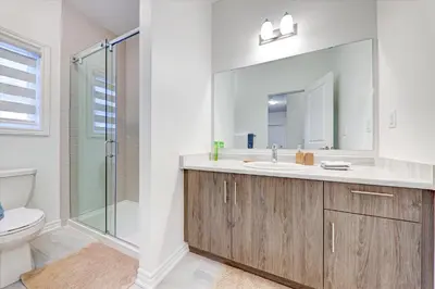a bathroom with a sink and a shower at West Oak, Detached New Modern House In South Barrie - Built H plus ME Technology in Barrie