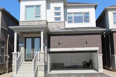 a large white house with a garage at West Oak, Detached New Modern House In South Barrie - Built H plus ME Technology in Barrie