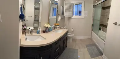 a bathroom with a sink and a shower and a toilet at Bright Private Single Bedroom Q33 in Mississauga