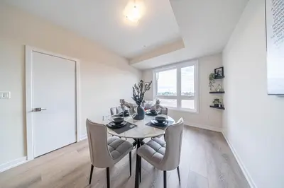 a dining room with a table and chairs at Entire home in Oakville, Canada in Oakville