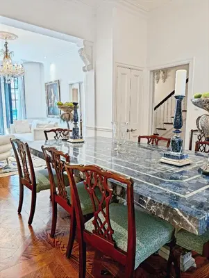 a dining room with a table and chairs at Hazelton Heritage in Toronto