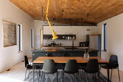 a dining room with a table and chairs at Willow Creek - Modern Sunlit Bungalow in Hillier