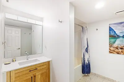 a bathroom with a sink and a shower at Wintergreen 122 in Blue Mountains