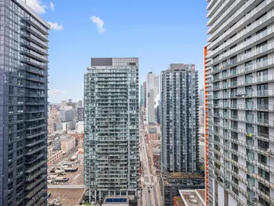 an aerial view of a city with tall buildings at The Aventi Suites - Downtown Toronto - Across TIFF Bell Lightbox in Toronto