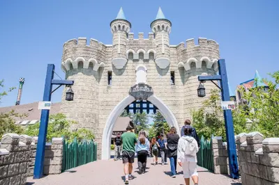 people walking through the entrance to a castle at Staybridge Suites Toronto Airport East by IHG in Toronto