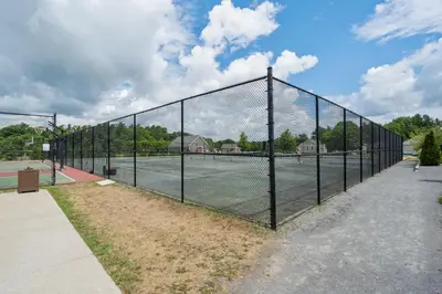a tennis net on a tennis court at The Cardinal - 7 Hollow in Cherry Valley