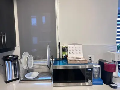 a kitchen with a microwave on a counter at 2bedroom Townhome in South Richmond Hill in Richmond Hill