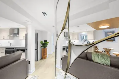 an open kitchen and living room in a house at Pinnacle of Luxury & Leisure- 2 BDM,2 BATH, KITCHEN in Whitby