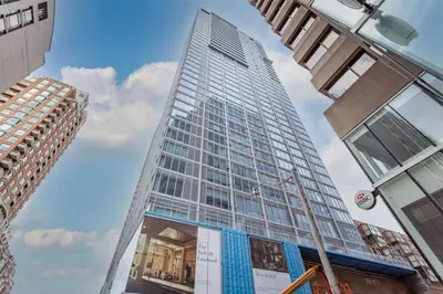 a tall building in a city with buildings at Executive 1BR-1BA Condo in the heart of downtown in Toronto