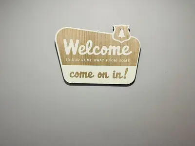 a sign that says welcome to our home have any room revive come on in at Holiday Home 7865LL in Niagara Falls