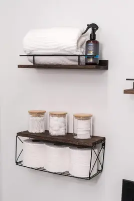 a shelf with toilet paper on a wall at Luxurious Home Away From Home in Pickering
