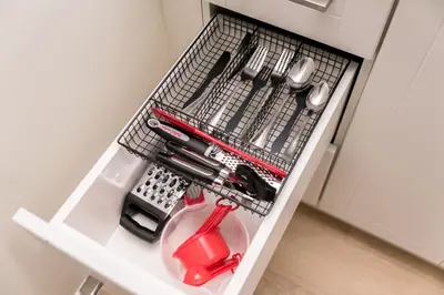 a dish basket filled with kitchen utensils at Luxurious Home Away From Home in Pickering