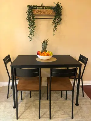 a black table with a bowl of fruit on it at 2 Bed-2Bath-Kitchen Private Family Couple Work in Newmarket