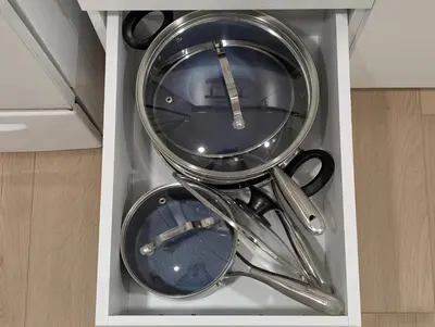 a bunch of utensils sitting in a drawer at The Urban Hideaway - Stylish Stay - Prime Spot in Hamilton