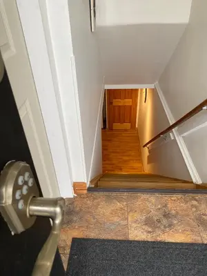 a view of a stairwell with a door and a room at Country Roads Dwelling in Dundas