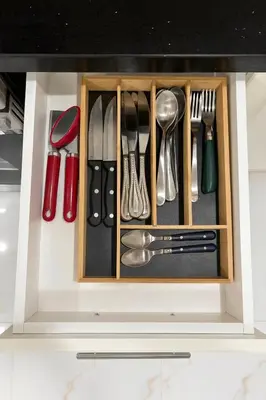 a cabinet filled with utensils in a kitchen at Newly Renovated 3BR Orangeville Basement Suite with Private Access, 10 Min Walk to Headwaters Hospital, 5 Min Drive to Mount Alverno! Ideal for Medical Stay, Family Travel & Work Trips! in Orangeville