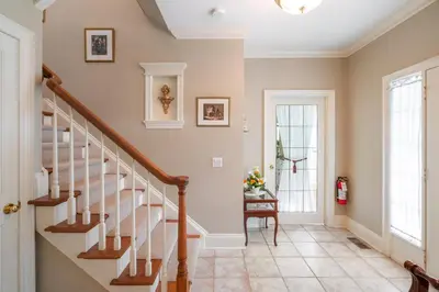 a staircase in a home with a stair case at John & Gate House boutique Bed and Breakfast in Niagara on the Lake