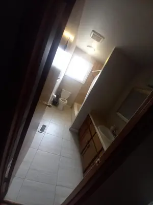 an overhead view of a bathroom with a toilet and a sink at Stay in Waterloo-Kitchener-Downtown-FREE WIFI & PARKING in Waterloo