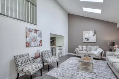 a living room with a couch and chairs at The Rosewood 1 Bedroom Basement Retreat in Vaughan