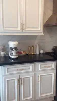 a kitchen with white cabinets and a counter top at Private Room In Luxury Home in Innisfil