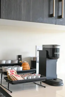 a kitchen with two trays of food on a counter at Modern 3Bed Home 10 Mins to Niagra Falls in Thorold