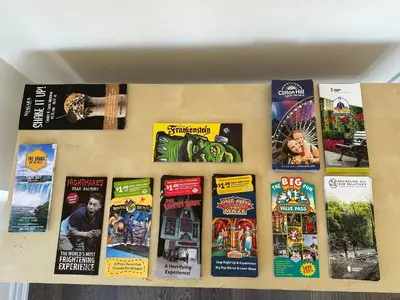 a bunch of books sitting on a wall at World Cup Soccer Fans Stay! Luxury 4BR Family Retreat in Thorold, Just 10 Mins Niagara Falls, Clifton Hill & Wineries Free Wi-Fi, Free Parking in Thorold