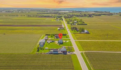 an aerial view of a farm with a house and a road at Wonderful house in Niagara on the Lake