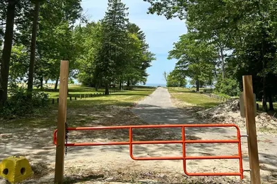 a gate on the side of a road at Wavy Daze in Wasaga Beach
