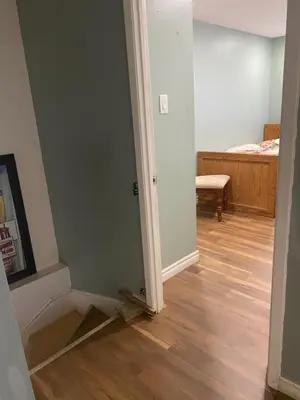 an empty room with a door open to a bedroom at Peaceful and Private Room in Brampton