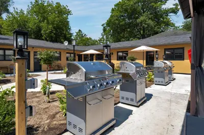 a group of appliances in front of a building at Adrian's Suites 1 Bedroom Junior Suite in Wasaga Beach