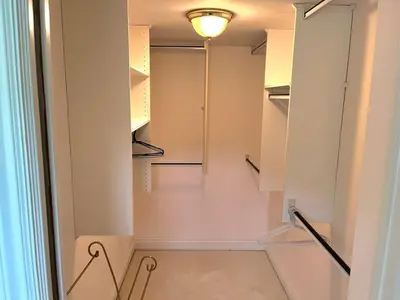 a walk in closet with shelves and a light at Summer Escape Close to the City in Newmarket