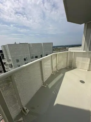 a balcony with a view of a building at Vaughan Cozy 1 Bedroom Condo in Vaughan