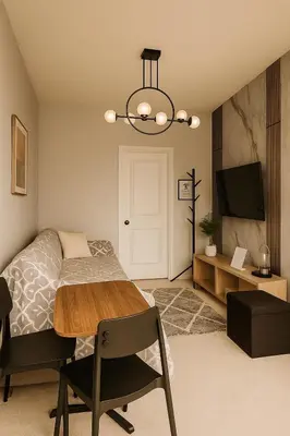 a bedroom with a bed and a table and a television at Vellore's Ritz and Rest House in Vaughan