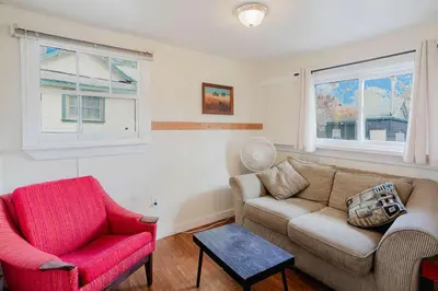 a living room with a couch and two chairs at 2-Bedroom Cottage #5 - Lodgepole Pine in Gravenhurst