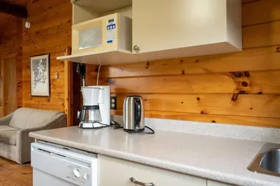 a kitchen with a coffee maker on a counter at Lake Muskoka Deluxe 3-bdrm Cottage - Pier 100 #80 in Port Carling