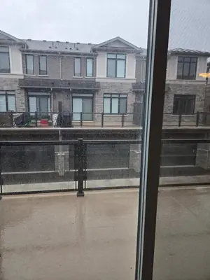 a view of a building from a window at Modern 4 Bedroom Home -Oakville in Oakville
