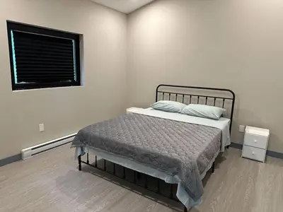a bedroom with a bed and a window at 3-bedroom Villa in Lakefield #17 in Lakefield