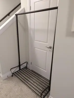 a door frame next to a white door at Spacious Luxury walk out Basement in Kitchener