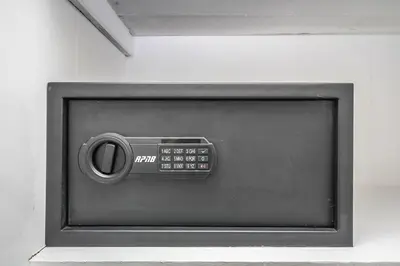 a television with a remote control in a room at The Cozy Shore Cottage - Standard Single in Wasaga Beach